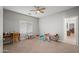 Spacious playroom featuring neutral walls, beige carpet, desk space, and playful decor, ideal for activities at 2243 E Cortez Dr, Gilbert, AZ 85234