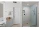 Bathroom with glass shower, tile surround, and decor insert at 2243 E Cortez Dr, Gilbert, AZ 85234
