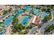 Overhead view of well maintained tennis courts surrounded by mature trees at 2243 E Cortez Dr, Gilbert, AZ 85234