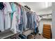 Walk-in closet featuring built in storage and two levels of clothing rods at 2243 E Cortez Dr, Gilbert, AZ 85234