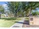 Scenic community walkway lined with mature trees and manicured green spaces at 2275 N Heritage St, Buckeye, AZ 85396