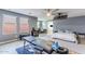 Comfortable bedroom featuring ceiling fan, workspace, and carpet floors at 2275 N Heritage St, Buckeye, AZ 85396