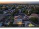 Aerial view of backyard showcasing the pool, patio, and neatly kept yard at 2661 E Los Alamos Ct, Gilbert, AZ 85295