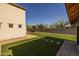 Enjoy the backyard's artificial grass, perfect for recreation and relaxation, with easy access from the home at 2661 E Los Alamos Ct, Gilbert, AZ 85295