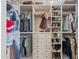 Spacious walk-in closet with custom shelving, drawers, and hanging rods for optimal organization at 2661 E Los Alamos Ct, Gilbert, AZ 85295