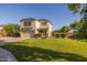 Charming two-story house with manicured lawn, desert landscaping, and a welcoming front entrance at 2661 E Los Alamos Ct, Gilbert, AZ 85295