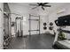 Home gym equipped with various workout machines and weights, providing a dedicated fitness space at 2661 E Los Alamos Ct, Gilbert, AZ 85295