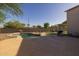 The backyard pool and outdoor area offer a perfect space for relaxation and entertainment at 2661 E Los Alamos Ct, Gilbert, AZ 85295