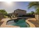 Inviting backyard pool offers a relaxing escape with clear water and ample space for lounging by the home at 2661 E Los Alamos Ct, Gilbert, AZ 85295