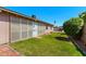 Relaxing backyard has a screened patio and scenic waterfall by the pool at 2804 N Nebraska St, Chandler, AZ 85225