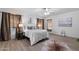 Serene bedroom with a comfortable bed, modern decor, and natural light from large windows at 2804 N Nebraska St, Chandler, AZ 85225