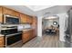 Galley kitchen with stainless steel appliances offering a practical space for cooking at 2804 N Nebraska St, Chandler, AZ 85225