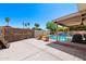 Inviting pool area with a covered patio and decorative painted wall adding a vibrant touch at 2804 N Nebraska St, Chandler, AZ 85225