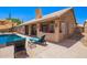 Inviting backyard features a private pool and a covered patio for outdoor enjoyment at 30645 N 44Th St, Cave Creek, AZ 85331
