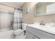 Bathroom featuring neutral color palette, shower and tub combo, and vanity sink at 30645 N 44Th St, Cave Creek, AZ 85331