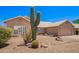 Charming home featuring desert landscaping and beautiful large cactus at 30645 N 44Th St, Cave Creek, AZ 85331
