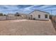 Large backyard with gravel landscaping and block wall, perfect for creating an outdoor oasis at 30996 W Osborn Rd, Buckeye, AZ 85396