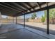 This backyard offers a covered patio, block wall, and low-maintenance desert landscaping at 3208 N El Dorado Dr, Chandler, AZ 85224