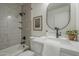 Bathroom with updated shower, sink, and decorative touches at 3208 N El Dorado Dr, Chandler, AZ 85224