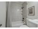 Clean, updated bathroom featuring a tiled shower and decorative touches at 3208 N El Dorado Dr, Chandler, AZ 85224