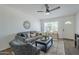 Cozy living room with a comfortable sofa and two arm chairs and natural light at 3208 N El Dorado Dr, Chandler, AZ 85224