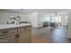 Open-concept living space with views of the kitchen and dining area at 3208 N El Dorado Dr, Chandler, AZ 85224