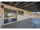 The covered patio features a sliding glass door for indoor/outdoor living at 3208 N El Dorado Dr, Chandler, AZ 85224