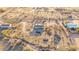 Desert community with sparse foliage and one-story ranch homes at 3349 N Ralston Rd, Maricopa, AZ 85139