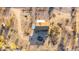 Aerial view of a one-story house, revealing its roof and the surrounding desert landscape at 3349 N Ralston Rd, Maricopa, AZ 85139