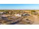 The property features a desert landscape and is surrounded by stunning mountain views at 3349 N Ralston Rd, Maricopa, AZ 85139