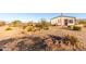 Home with a large backyard and natural desert landscaping at 3349 N Ralston Rd, Maricopa, AZ 85139