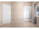 Bedroom with tile flooring, a built in closet, and natural light from the window at 3349 N Ralston Rd, Maricopa, AZ 85139