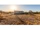 The home features a large backyard and beautiful desert surroundings at 3349 N Ralston Rd, Maricopa, AZ 85139