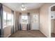 Bright living room with hard wood floors, light-colored walls, and natural light at 3349 N Ralston Rd, Maricopa, AZ 85139