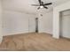 Bedroom with neutral carpet, closet, and ceiling fan at 3441 E Taylor St, Phoenix, AZ 85008