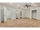 Spacious bedroom featuring neutral carpet, a ceiling fan, and closet space at 3441 E Taylor St, Phoenix, AZ 85008