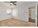Bedroom with neutral carpet, ceiling fan, and natural light at 3441 E Taylor St, Phoenix, AZ 85008