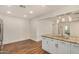Modern kitchen island with granite countertops and stylish pendant lighting at 3441 E Taylor St, Phoenix, AZ 85008