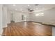 Spacious living area with wood-style flooring, double doors, and plenty of light at 3441 E Taylor St, Phoenix, AZ 85008
