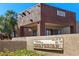 Exterior view of the Graybriar community showing building number and landscape at 3810 N Maryvale Pkwy # 1059, Phoenix, AZ 85031