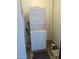 The functional laundry room features a stacked washer and dryer at 3810 N Maryvale Pkwy # 1059, Phoenix, AZ 85031