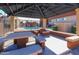 View of the picnic and grilling area with a nearby community pool at 3810 N Maryvale Pkwy # 1059, Phoenix, AZ 85031