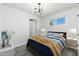 Bright bedroom with stylish decor, modern lighting, and comfortable furnishings at 3822 W Flower St, Phoenix, AZ 85019