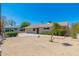 Charming single-story home with a well-manicured front yard, xeriscape, and inviting curb appeal at 3822 W Flower St, Phoenix, AZ 85019
