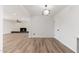 Bright living room boasts hardwood floors and cozy fireplace for relaxed living at 3822 W Flower St, Phoenix, AZ 85019