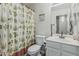 Bathroom featuring toilet, vanity and cacti themed shower curtain is perfect for everyday living at 3856 E Encinas Ave, Gilbert, AZ 85234