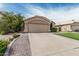 Single-story home featuring a concrete driveway leading to a two-car garage at 3856 E Encinas Ave, Gilbert, AZ 85234