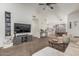 Spacious living room leading to the dining area and featuring neutral tones and ample seating at 3856 E Encinas Ave, Gilbert, AZ 85234
