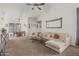 Inviting living room with a cozy seating area, a dining space, and natural light at 3856 E Encinas Ave, Gilbert, AZ 85234
