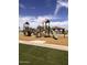 Community playground offers a slide, play structure, and shaded picnic area for Gathering fun at 3886 E Ficus Way, Gilbert, AZ 85298
